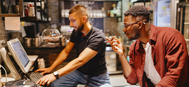 Business men looking at the computer