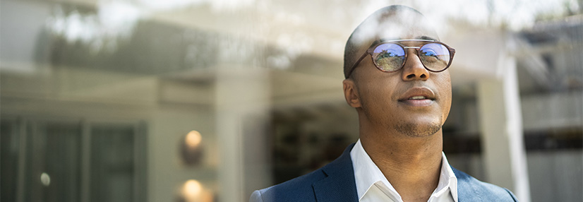 Man reflecting on how his finances reflect his professional standards