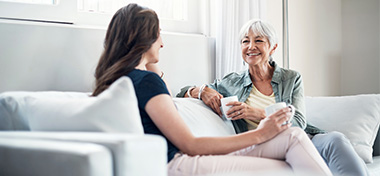 Older woman seeking advice from a financial adviser