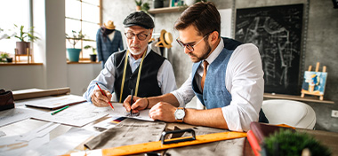 Business men working to increase sale value
