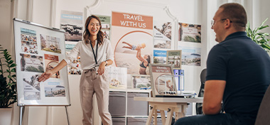Travel Agent owner with customer