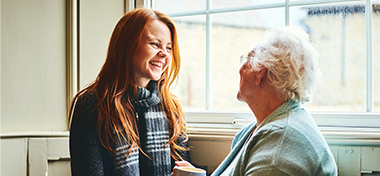 Grandmother talking to her grandaughter