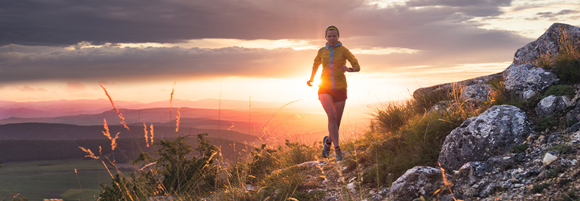 Woman running up a hill