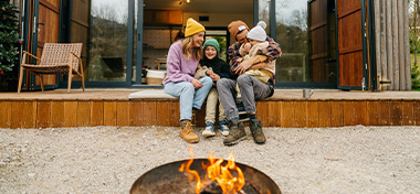 Family keeping warm on winter break