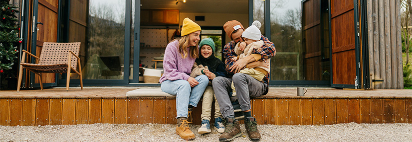 Family keeping warm on winter break