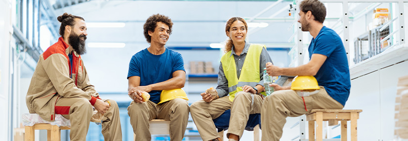 Workers chatting with their manager