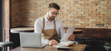 Business owner reviewing his strategy