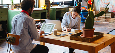 Business owners discussing a shareholder agreement