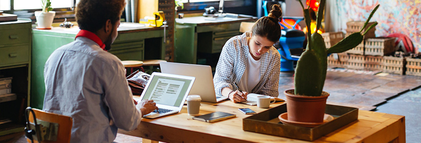 Business owners discussing a shareholder agreement