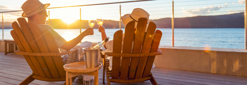 Couple enjoying life abroad overlooking the sea