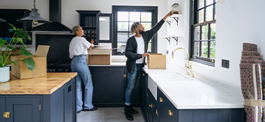 Couple moving into their house