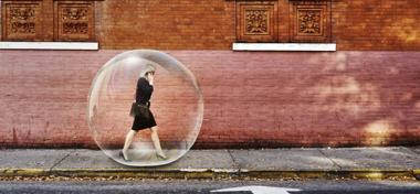Women walking down the street in a bubble