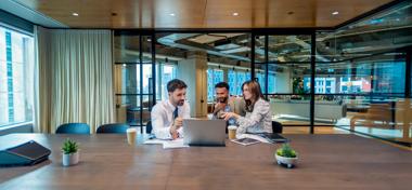 business owners with financial adviser