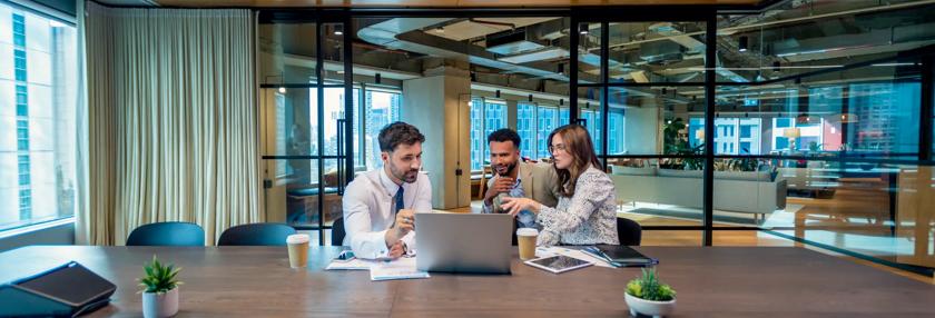 business owners with financial adviser