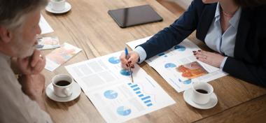 Financial adviser with clients