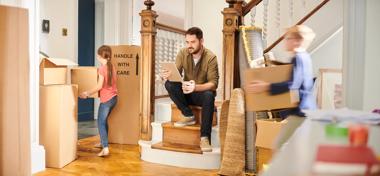 A Dad moving him and his kids into their new home