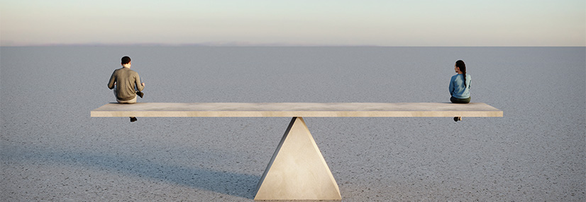 Man and woman on seesaw