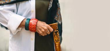 Senior hands Improving mobility with a walking stickSenior hands Improving mobility with a walking stick