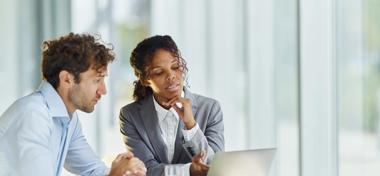 Two business colleagues planning