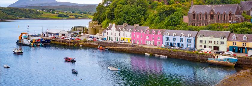 Skye island Portree Harbour colorful houses in Highlands Scotland UK