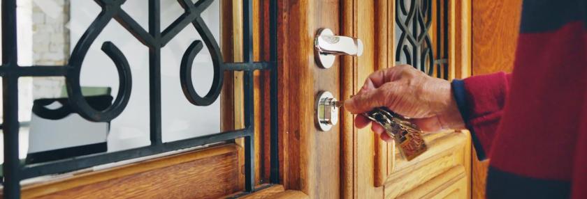 Man opening the front door of his vacation rental