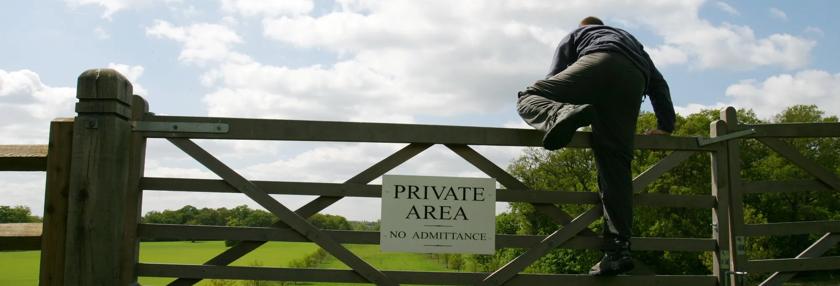 Man going into private land