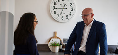 two people in conversation