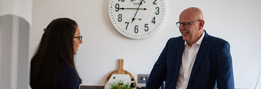 two people in conversation