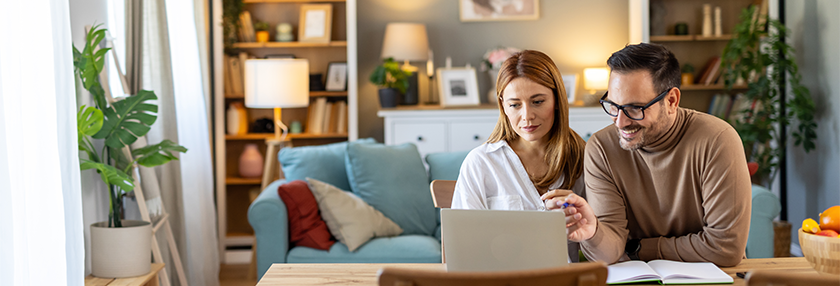 Couple looking at the laptop