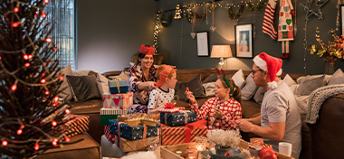 Family opening Christmas gifts