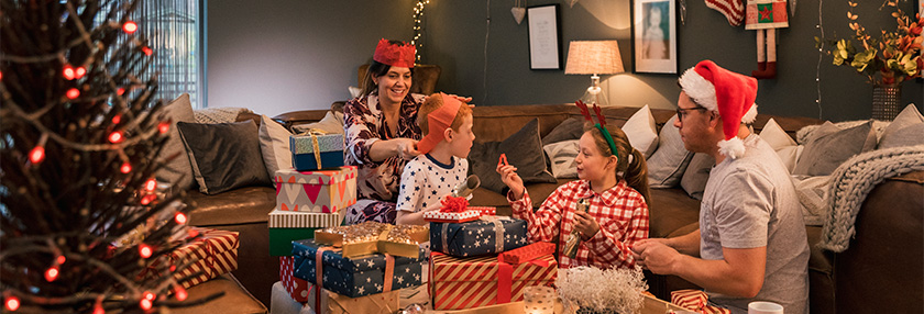 Family opening Christmas gifts