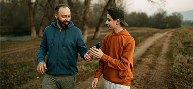 Father and son talking about money