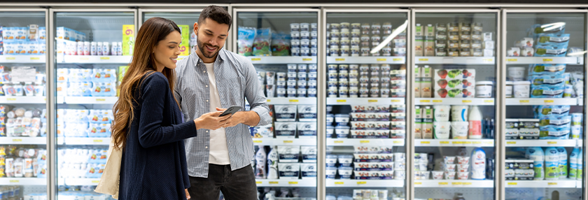 Man and a woman doing grocery shopping