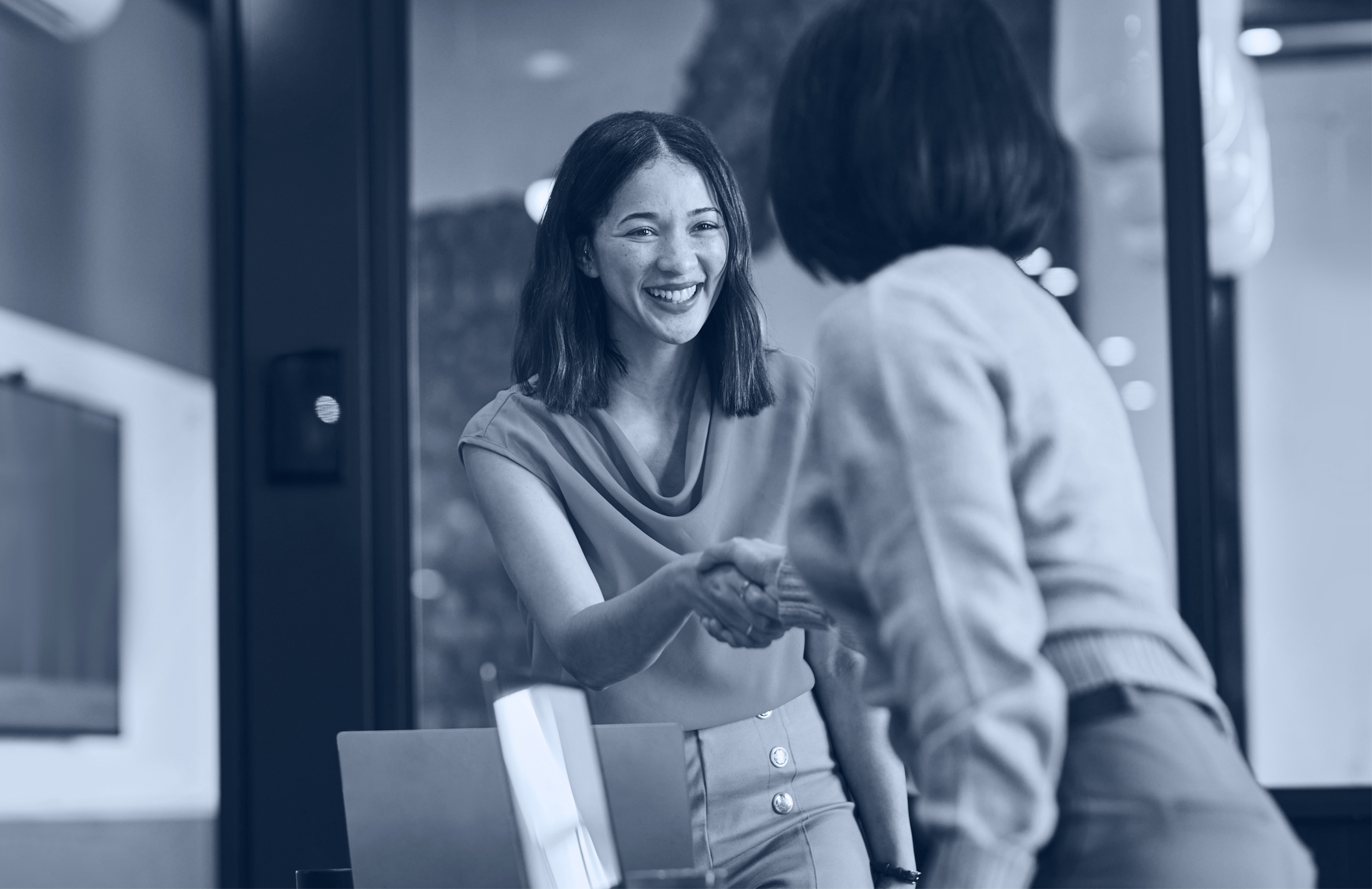 Ladies shaking hands