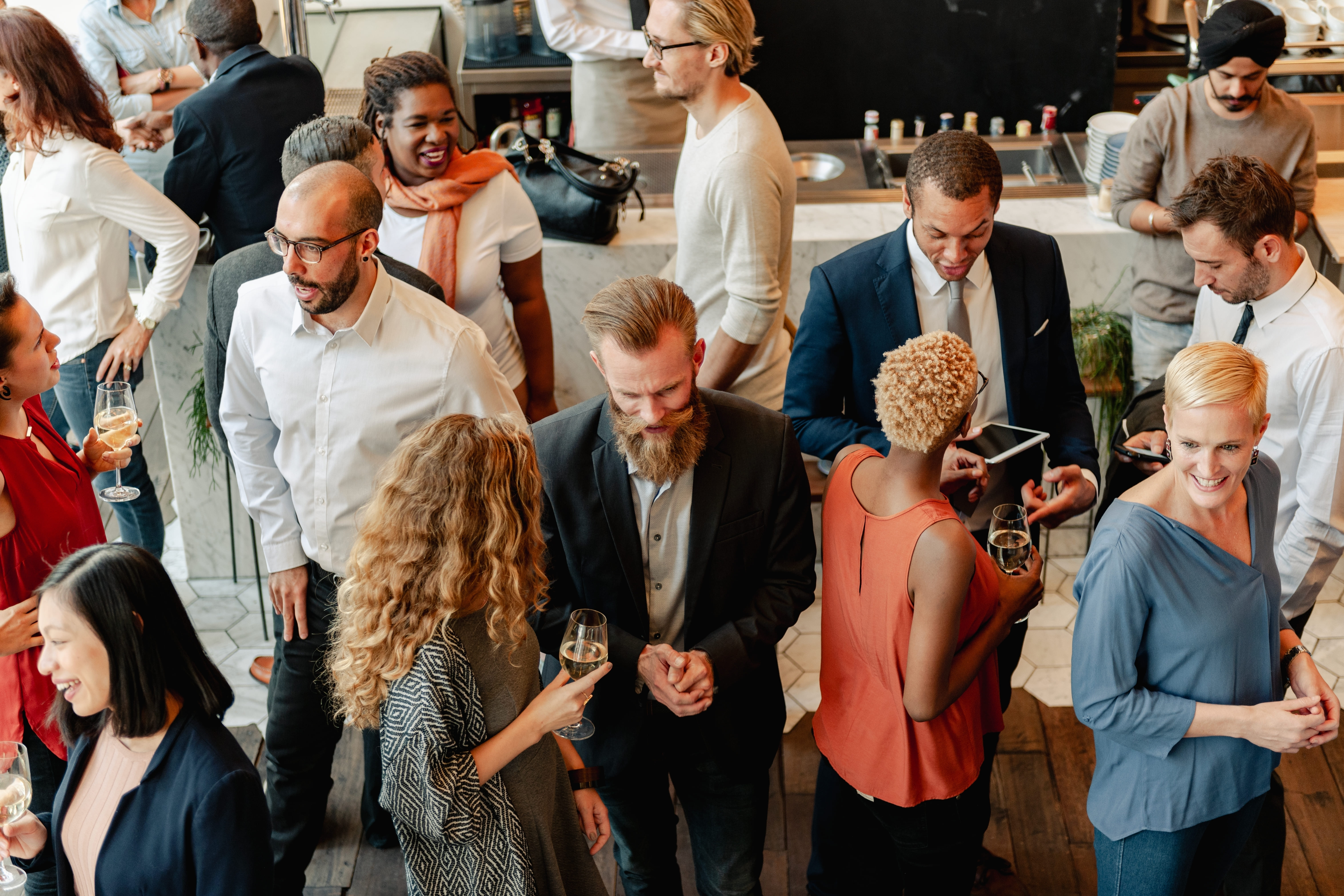 Lots of people in a room networking