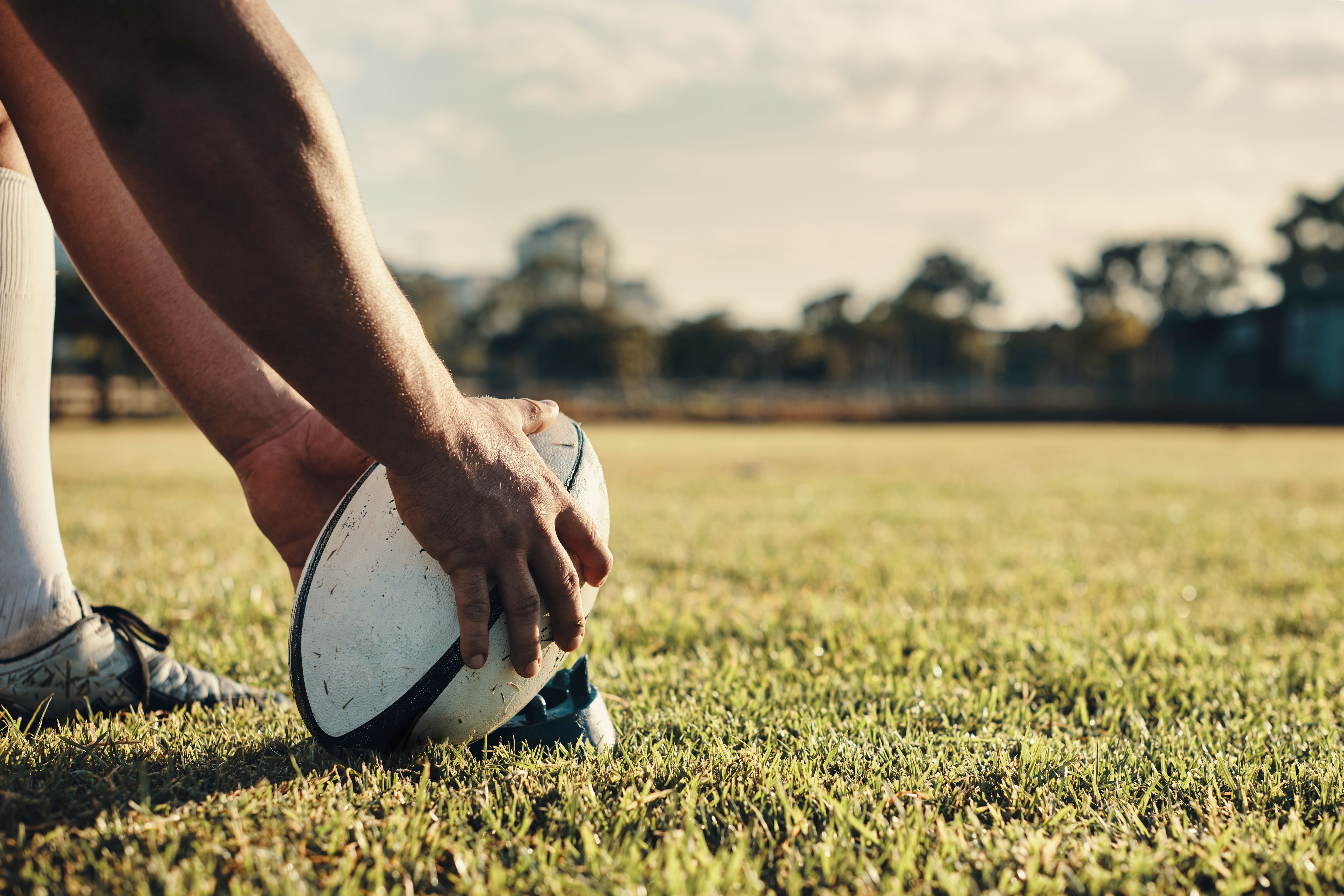 Rugby ball about to be kicked