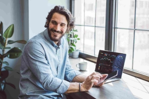 Man looking at SJP website