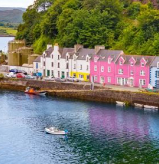 Skye island Portree Harbour colorful houses in Highlands Scotland UK